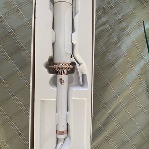 T3 1.75 inch curling iron, 5 heat settings, used a handful of times.